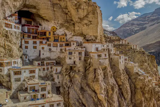 Cave monastery built into a dramatic cliffside in Ladakh